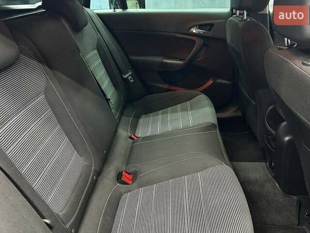 Чорний Опель Інсігнія, об'ємом двигуна 1.96 л та пробігом 324 тис. км за 10800 $, фото 14 на Automoto.ua