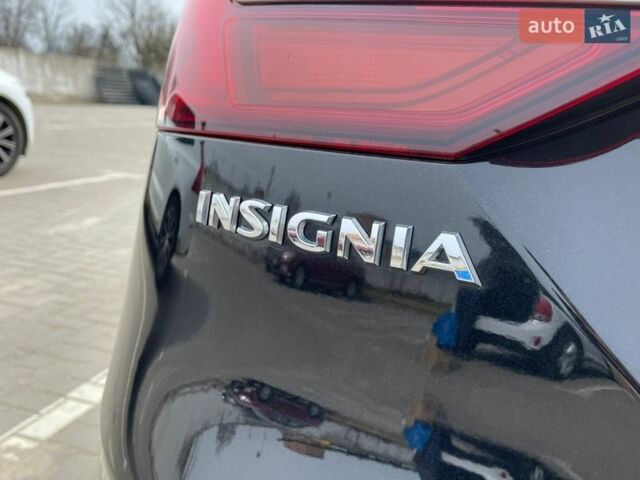 Чорний Опель Інсігнія, об'ємом двигуна 1.96 л та пробігом 238 тис. км за 11500 $, фото 49 на Automoto.ua