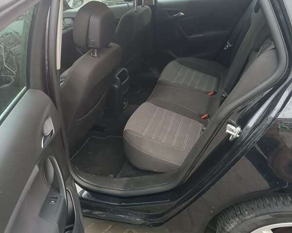 Черный Опель Инсигния, объемом двигателя 1.6 л и пробегом 260 тыс. км за 8750 $, фото 42 на Automoto.ua