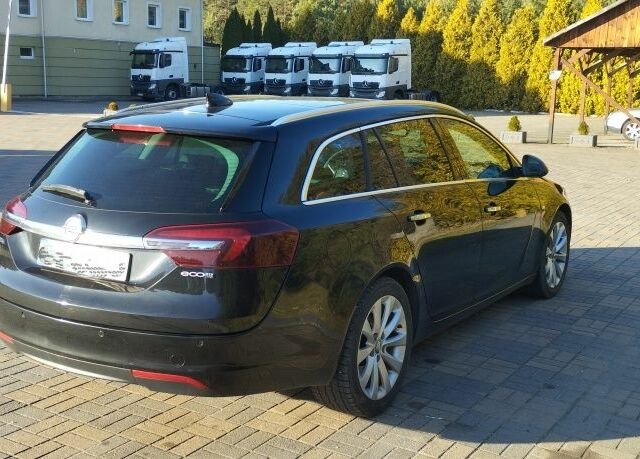 Черный Опель Инсигния, объемом двигателя 1 л и пробегом 156 тыс. км за 7000 $, фото 3 на Automoto.ua