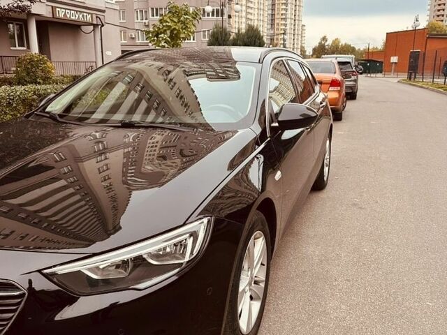 Чорний Опель Інсігнія, об'ємом двигуна 1.96 л та пробігом 217 тис. км за 13500 $, фото 1 на Automoto.ua