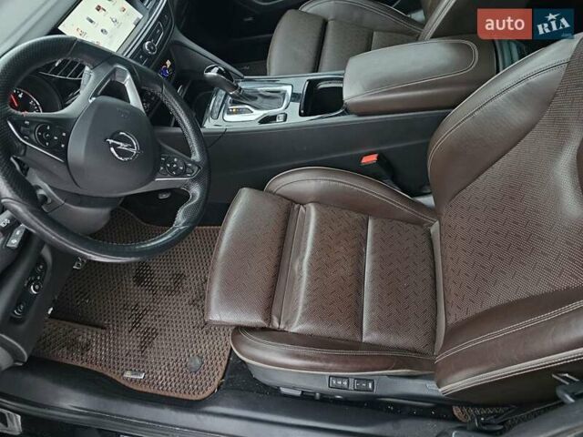 Чорний Опель Інсігнія, об'ємом двигуна 1.96 л та пробігом 210 тис. км за 17000 $, фото 8 на Automoto.ua