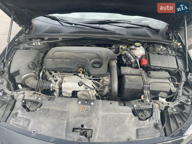 Черный Опель Инсигния, объемом двигателя 1.6 л и пробегом 190 тыс. км за 15800 $, фото 6 на Automoto.ua