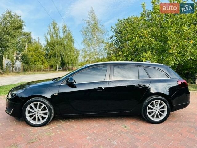 Черный Опель Инсигния, объемом двигателя 1.6 л и пробегом 47 тыс. км за 14500 $, фото 1 на Automoto.ua