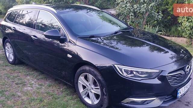 Черный Опель Инсигния, объемом двигателя 1.96 л и пробегом 199 тыс. км за 14300 $, фото 2 на Automoto.ua