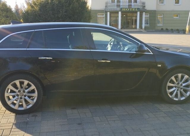 Черный Опель Инсигния, объемом двигателя 1 л и пробегом 156 тыс. км за 7000 $, фото 13 на Automoto.ua