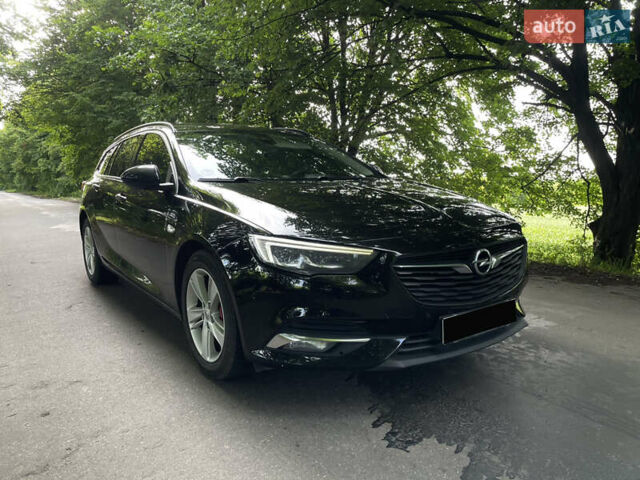 Черный Опель Инсигния, объемом двигателя 2 л и пробегом 235 тыс. км за 13950 $, фото 5 на Automoto.ua