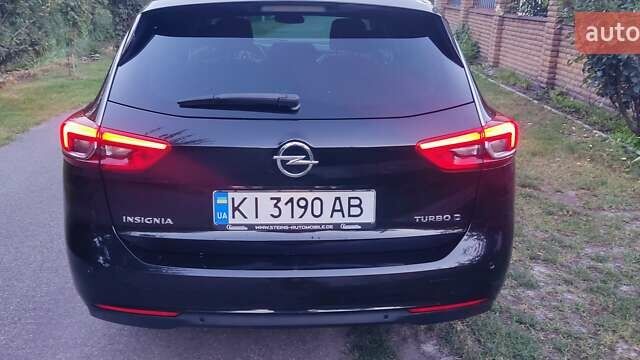Черный Опель Инсигния, объемом двигателя 1.96 л и пробегом 199 тыс. км за 14300 $, фото 18 на Automoto.ua