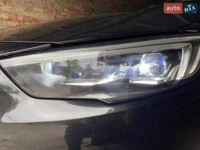 Черный Опель Инсигния, объемом двигателя 1.96 л и пробегом 163 тыс. км за 16300 $, фото 14 на Automoto.ua