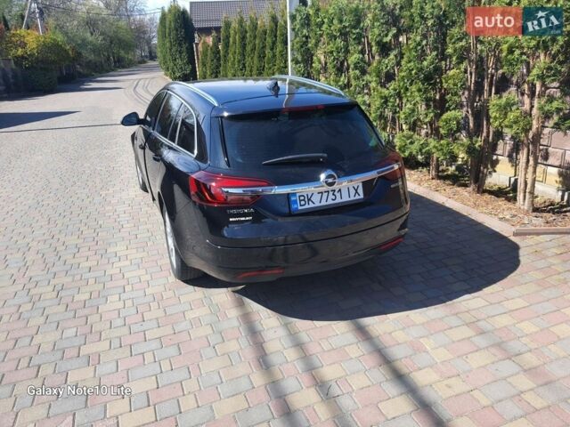 Чорний Опель Інсігнія, об'ємом двигуна 1.6 л та пробігом 114 тис. км за 9300 $, фото 3 на Automoto.ua