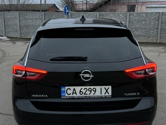 Чорний Опель Інсігнія, об'ємом двигуна 1.6 л та пробігом 211 тис. км за 13900 $, фото 5 на Automoto.ua