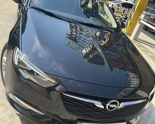 Черный Опель Инсигния, объемом двигателя 1.6 л и пробегом 190 тыс. км за 15800 $, фото 55 на Automoto.ua