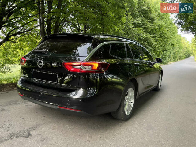 Черный Опель Инсигния, объемом двигателя 2 л и пробегом 235 тыс. км за 13950 $, фото 10 на Automoto.ua