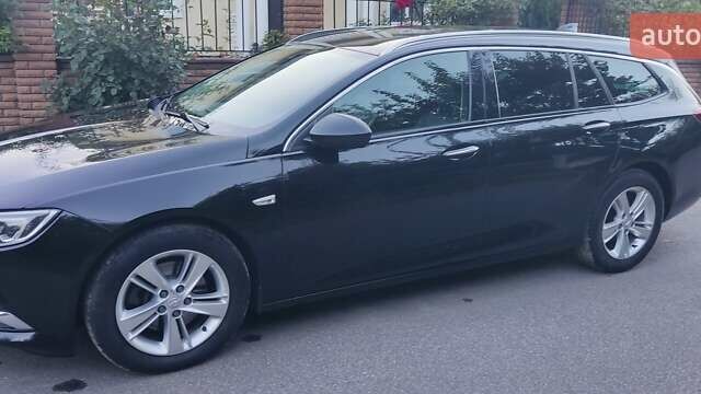 Черный Опель Инсигния, объемом двигателя 1.96 л и пробегом 199 тыс. км за 14300 $, фото 3 на Automoto.ua