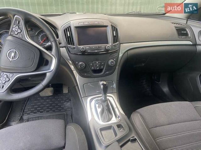 Чорний Опель Інсігнія, об'ємом двигуна 2 л та пробігом 197 тис. км за 10900 $, фото 5 на Automoto.ua