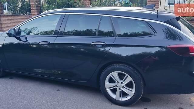 Черный Опель Инсигния, объемом двигателя 1.96 л и пробегом 199 тыс. км за 14300 $, фото 4 на Automoto.ua