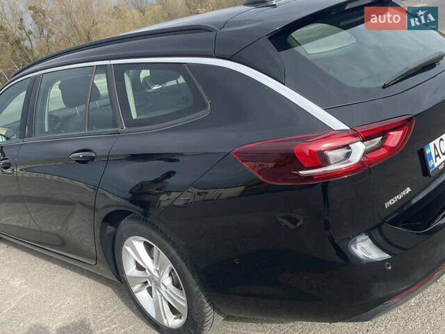 Черный Опель Инсигния, объемом двигателя 1.6 л и пробегом 190 тыс. км за 15800 $, фото 10 на Automoto.ua