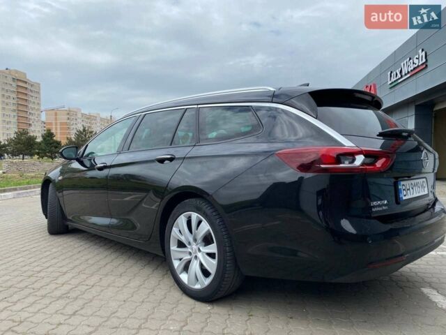 Чорний Опель Інсігнія, об'ємом двигуна 1.96 л та пробігом 270 тис. км за 14000 $, фото 7 на Automoto.ua