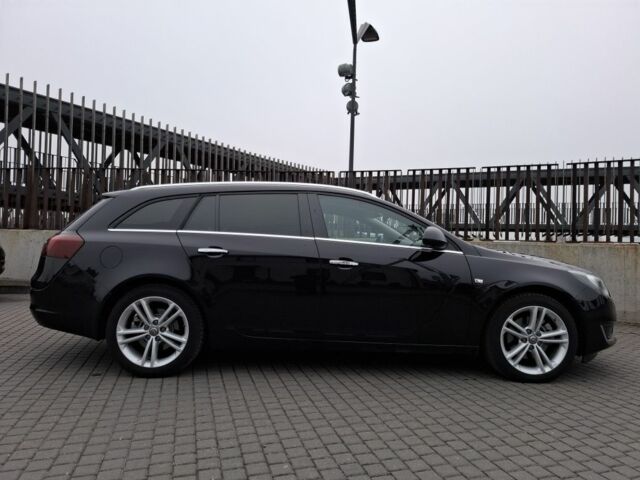 Чорний Опель Інсігнія, об'ємом двигуна 2 л та пробігом 234 тис. км за 12940 $, фото 5 на Automoto.ua