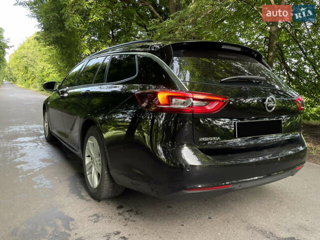 Черный Опель Инсигния, объемом двигателя 2 л и пробегом 235 тыс. км за 13950 $, фото 8 на Automoto.ua