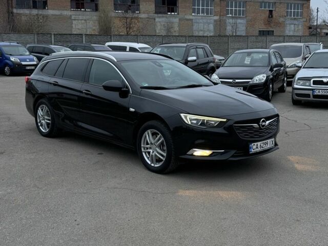 Чорний Опель Інсігнія, об'ємом двигуна 1.6 л та пробігом 211 тис. км за 13900 $, фото 2 на Automoto.ua