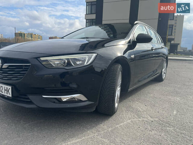 Черный Опель Инсигния, объемом двигателя 1.6 л и пробегом 190 тыс. км за 15800 $, фото 1 на Automoto.ua