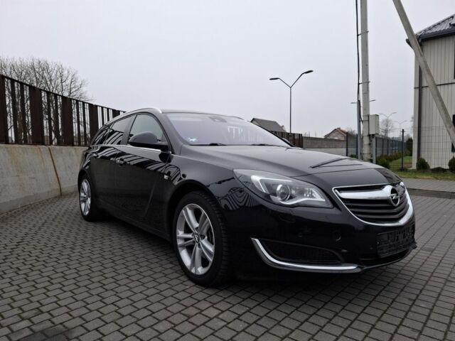 Чорний Опель Інсігнія, об'ємом двигуна 2 л та пробігом 234 тис. км за 12940 $, фото 2 на Automoto.ua