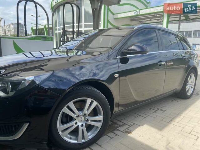 Чорний Опель Інсігнія, об'ємом двигуна 2 л та пробігом 197 тис. км за 10900 $, фото 3 на Automoto.ua