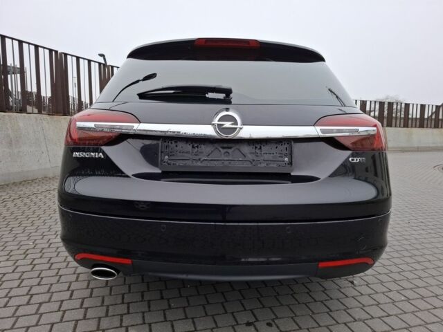 Чорний Опель Інсігнія, об'ємом двигуна 2 л та пробігом 234 тис. км за 12940 $, фото 6 на Automoto.ua