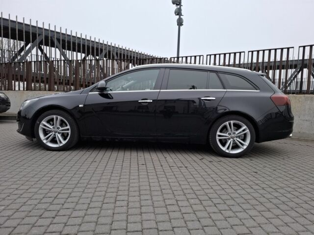 Чорний Опель Інсігнія, об'ємом двигуна 2 л та пробігом 234 тис. км за 12940 $, фото 4 на Automoto.ua