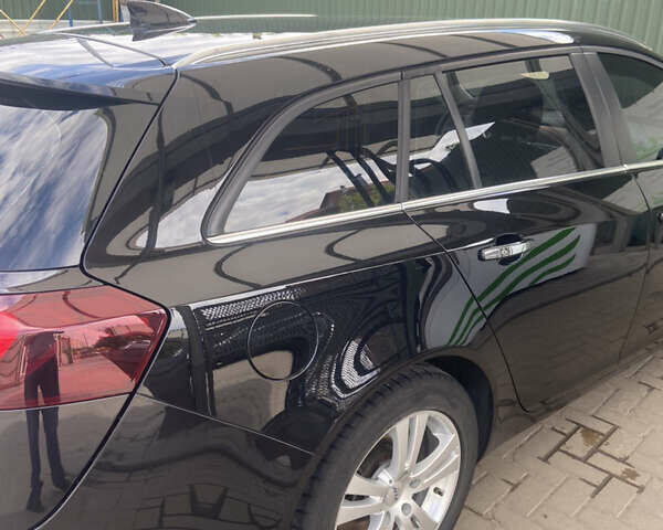 Чорний Опель Інсігнія, об'ємом двигуна 2 л та пробігом 197 тис. км за 10900 $, фото 7 на Automoto.ua