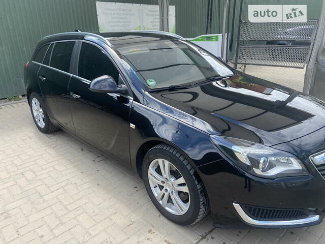 Чорний Опель Інсігнія, об'ємом двигуна 2 л та пробігом 197 тис. км за 10900 $, фото 1 на Automoto.ua