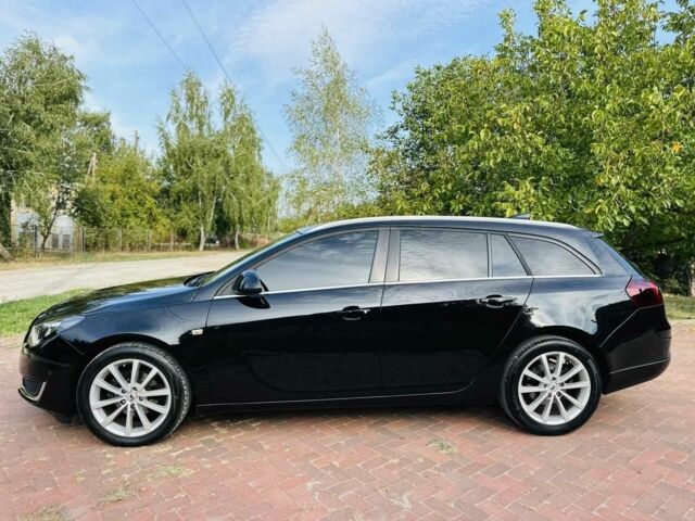 Черный Опель Инсигния, объемом двигателя 1.6 л и пробегом 47 тыс. км за 13800 $, фото 1 на Automoto.ua