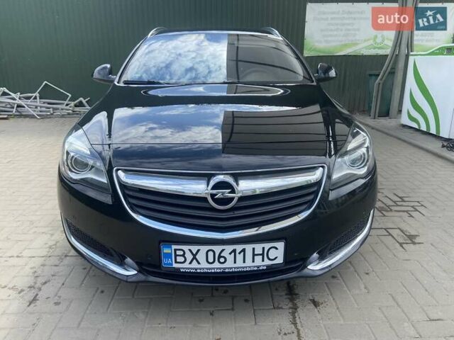 Чорний Опель Інсігнія, об'ємом двигуна 2 л та пробігом 197 тис. км за 10900 $, фото 2 на Automoto.ua