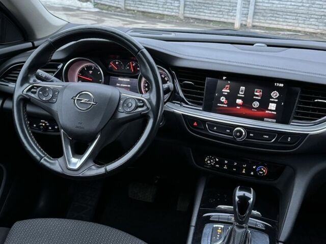 Чорний Опель Інсігнія, об'ємом двигуна 1.6 л та пробігом 211 тис. км за 13900 $, фото 10 на Automoto.ua