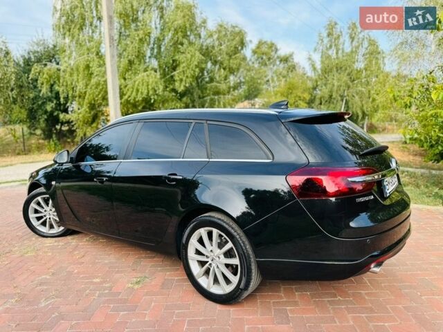 Черный Опель Инсигния, объемом двигателя 1.6 л и пробегом 47 тыс. км за 14500 $, фото 5 на Automoto.ua