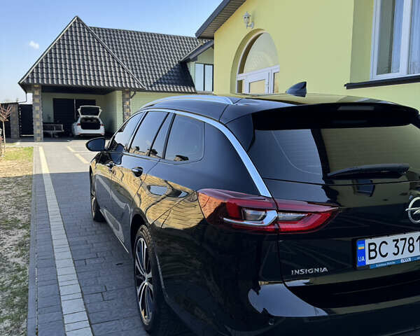 Чорний Опель Інсігнія, об'ємом двигуна 1.96 л та пробігом 240 тис. км за 13999 $, фото 3 на Automoto.ua