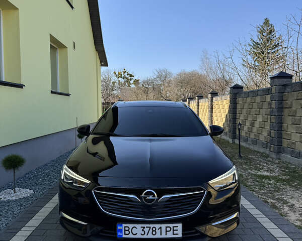 Чорний Опель Інсігнія, об'ємом двигуна 1.96 л та пробігом 240 тис. км за 13999 $, фото 1 на Automoto.ua