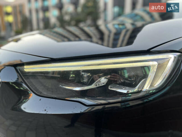 Черный Опель Инсигния, объемом двигателя 1.96 л и пробегом 241 тыс. км за 15900 $, фото 16 на Automoto.ua