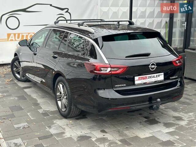Черный Опель Инсигния, объемом двигателя 1.96 л и пробегом 324 тыс. км за 13900 $, фото 1 на Automoto.ua