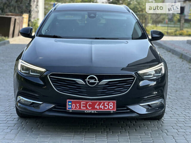 Черный Опель Инсигния, объемом двигателя 2 л и пробегом 270 тыс. км за 16700 $, фото 2 на Automoto.ua