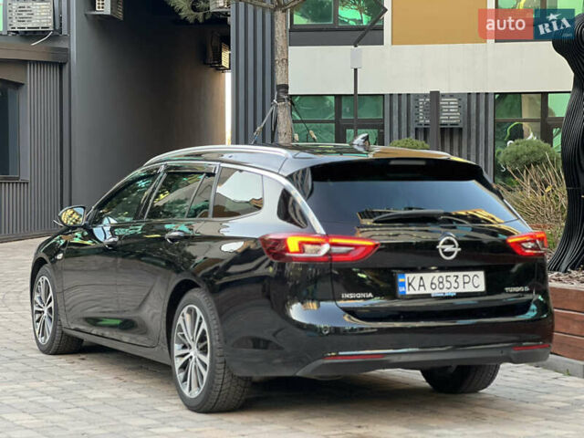 Черный Опель Инсигния, объемом двигателя 1.96 л и пробегом 241 тыс. км за 15900 $, фото 2 на Automoto.ua