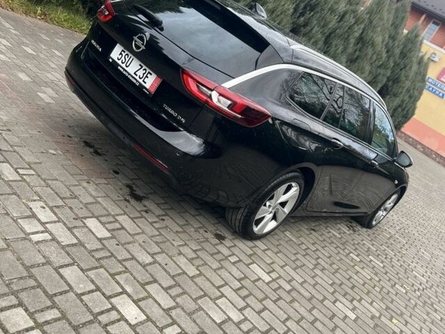 Черный Опель Инсигния, объемом двигателя 2 л и пробегом 220 тыс. км за 14900 $, фото 3 на Automoto.ua