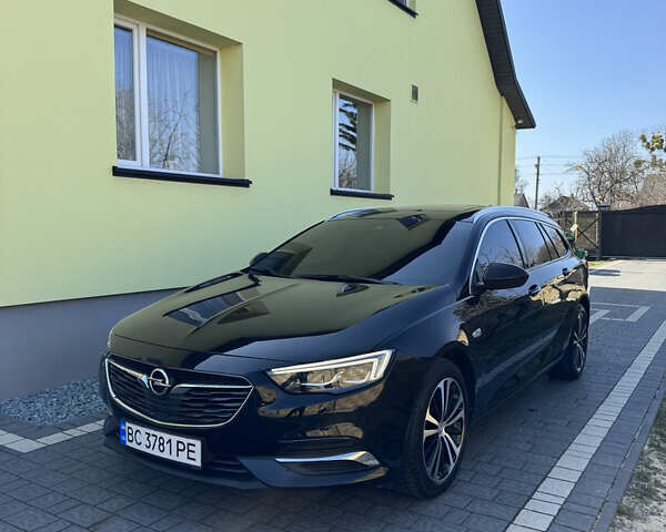 Чорний Опель Інсігнія, об'ємом двигуна 1.96 л та пробігом 240 тис. км за 13999 $, фото 2 на Automoto.ua