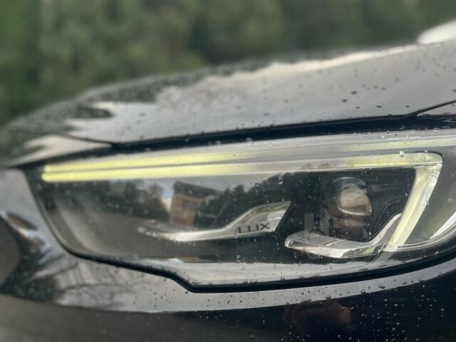 Черный Опель Инсигния, объемом двигателя 2 л и пробегом 220 тыс. км за 14900 $, фото 4 на Automoto.ua