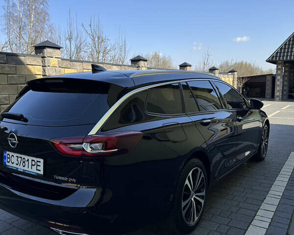 Чорний Опель Інсігнія, об'ємом двигуна 1.96 л та пробігом 240 тис. км за 13999 $, фото 4 на Automoto.ua