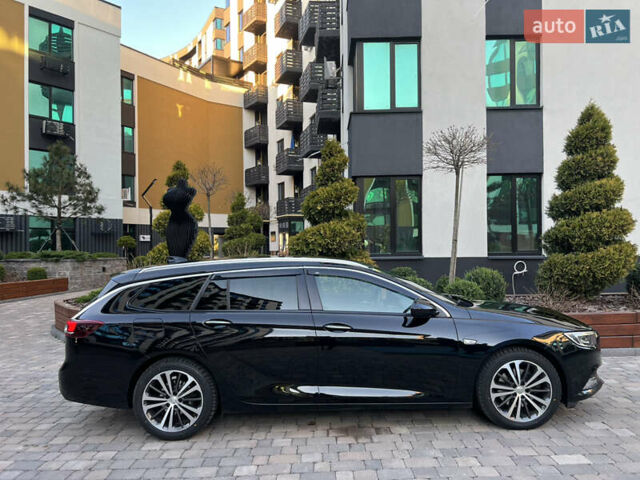 Черный Опель Инсигния, объемом двигателя 1.96 л и пробегом 241 тыс. км за 15900 $, фото 5 на Automoto.ua