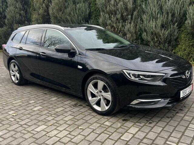 Черный Опель Инсигния, объемом двигателя 2 л и пробегом 220 тыс. км за 14900 $, фото 2 на Automoto.ua