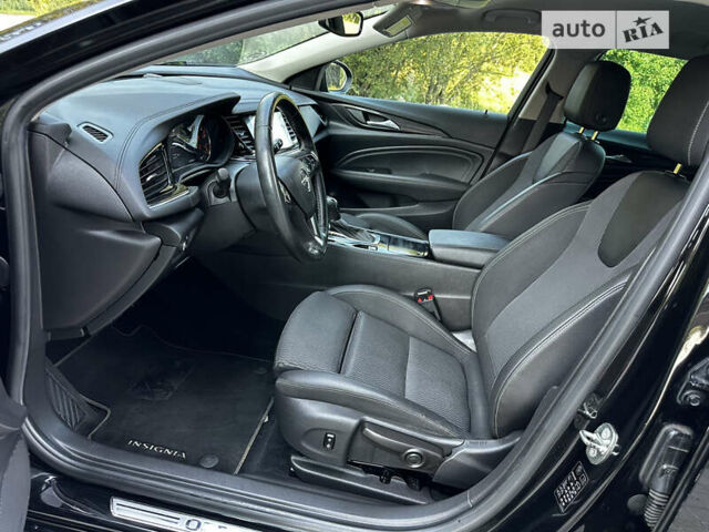 Черный Опель Инсигния, объемом двигателя 2 л и пробегом 270 тыс. км за 16700 $, фото 9 на Automoto.ua