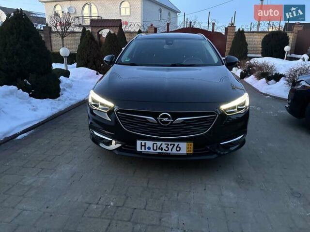Черный Опель Инсигния, объемом двигателя 1.96 л и пробегом 211 тыс. км за 14950 $, фото 12 на Automoto.ua